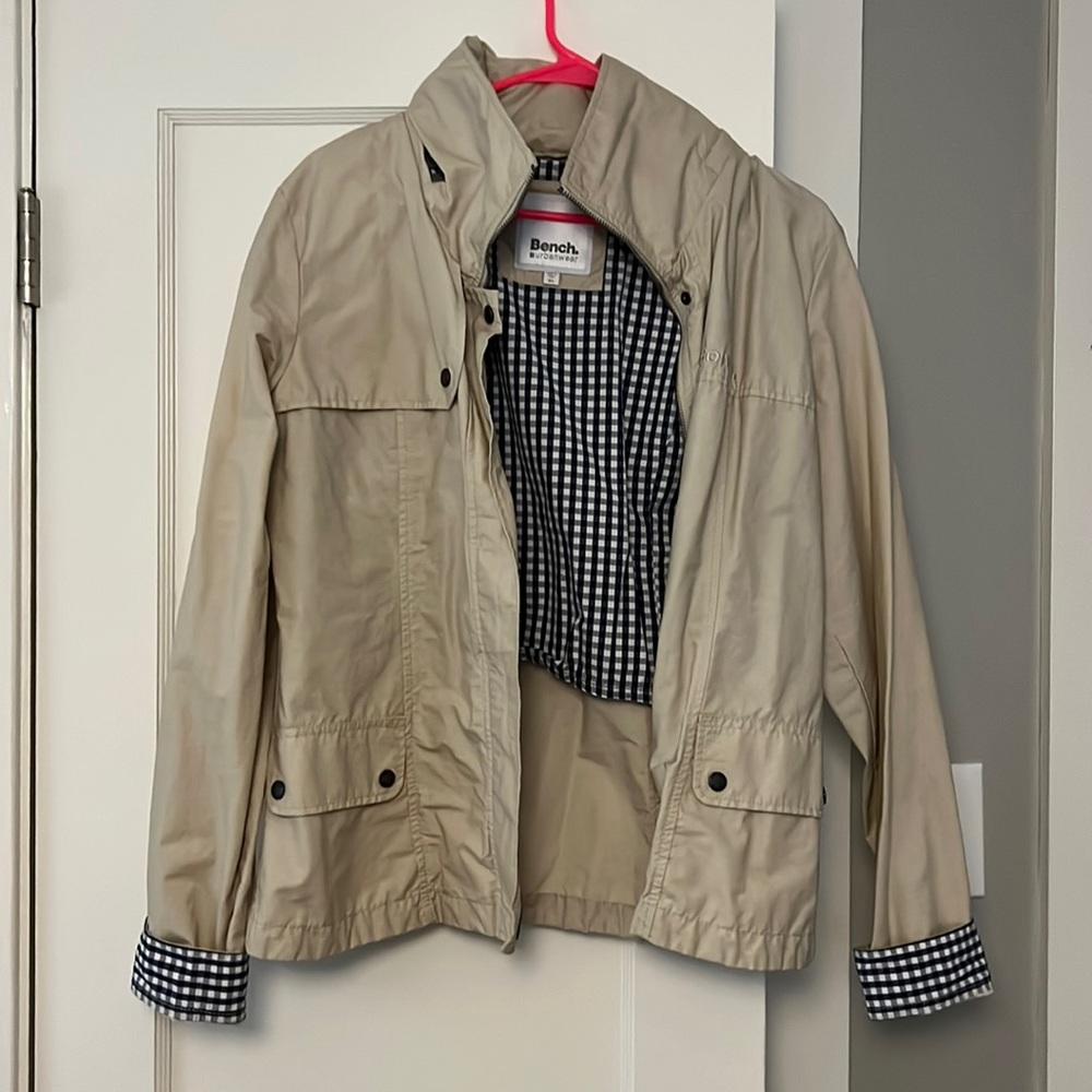 Bench women’s rain jacket in tan with hidden hood